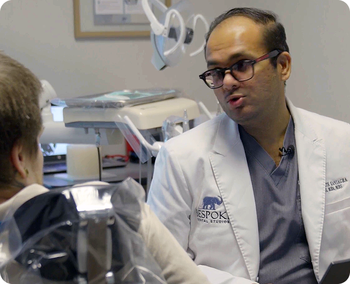 Patient and dentist interacting in the chair